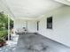 Carport with a bench and a view of the neighborhood at 6832 Treehaven Dr, Spring Hill, FL 34606