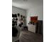 Bright bedroom with hard wood floors and a variety of decorations and designs at 9397 Northcliffe Blvd, Spring Hill, FL 34606