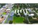 Aerial view of the home and neighborhood, showcasing its location near a school and surrounding greenery at 101 N Corona Ave, Clearwater, FL 33765