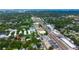 Panoramic aerial view highlighting the property's convenient location near a bustling street and surrounding greenery at 101 N Corona Ave, Clearwater, FL 33765