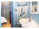 Ensuite bathroom with a stand-up shower and white sink at 101 N Corona Ave, Clearwater, FL 33765