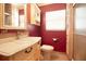 Bathroom with a vanity sink, toilet, and walk-in shower at 101 N Corona Ave, Clearwater, FL 33765