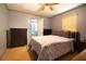 Cozy bedroom with laminate floors and ensuite bathroom at 101 N Corona Ave, Clearwater, FL 33765