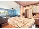 Bright kitchen features stainless steel appliances and opens to the living room at 101 N Corona Ave, Clearwater, FL 33765