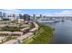 Beautiful waterfront condos with city views, lush greenery, and boat access in a vibrant coastal community at 1107 Normandy Trace Rd, Tampa, FL 33602