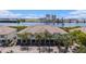 Stunning aerial view of condo building near water with industrial buildings in the background at 1107 Normandy Trace Rd, Tampa, FL 33602