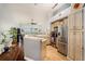 Modern kitchen featuring stainless steel appliances, ample countertop space, and an open view to the living area at 1107 Normandy Trace Rd, Tampa, FL 33602