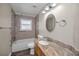Bathroom featuring granite countertops and tile surround shower and tub at 11279 Oakridge Trl, Seminole, FL 33772