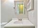 Bathroom with vanity, mirror, and toilet at 11304 Plumtree Ct, Riverview, FL 33579