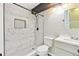 Bathroom with marble tile shower, hexagon tile floor, and modern vanity at 11304 Plumtree Ct, Riverview, FL 33579