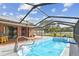 Beautiful screened-in pool with a cement patio, ideal for relaxing and enjoying the outdoors at 11304 Plumtree Ct, Riverview, FL 33579