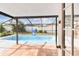 Screened pool enclosure with outdoor seating area perfect for entertaining and relaxation at 11304 Plumtree Ct, Riverview, FL 33579