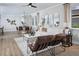 Bright living room features stylish furniture, modern decor, and ample natural light at 12574 Somatic Ct, Venice, FL 34293