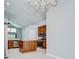 Spacious kitchen area with a center island, stainless steel appliances, and ample natural light at 15126 Shearcrest Dr, Lithia, FL 33547