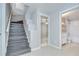 Staircase featuring wood steps that lead to the second floor and bathroom at 15126 Shearcrest Dr, Lithia, FL 33547