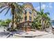 Attractive corner building with tropical landscaping and brick sidewalk for a warm, inviting feel at 501 S Moody Ave # 1134, Tampa, FL 33609