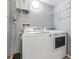 Laundry room featuring full-sized, front-loading washer and dryer at 501 S Moody Ave # 1134, Tampa, FL 33609