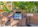 Outdoor brick built-in grill, perfect for community cookouts at 501 S Moody Ave # 1134, Tampa, FL 33609