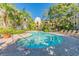 Community pool with sundeck offers lounge chairs to relax and soak up the sunshine at 501 S Moody Ave # 1134, Tampa, FL 33609