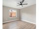 Empty room with a ceiling fan and a window at 5092 Abagail Dr, Spring Hill, FL 34608