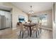 Cozy dining room with natural light, modern decor, and open layout at 5092 Abagail Dr, Spring Hill, FL 34608