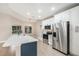 Modern kitchen with stainless steel appliances and a large island at 5092 Abagail Dr, Spring Hill, FL 34608