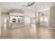 Bright, open living space featuring clean hardwood floors, neutral walls, and an open floor plan at 5092 Abagail Dr, Spring Hill, FL 34608