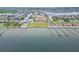 Waterfront condos are located within walking distance of empty lots, marinas, and the ocean at 6412 Mayra Shores Ln, Apollo Beach, FL 33572