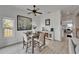 Gather in this dining room with modern decor and an abundance of natural light at 6412 Mayra Shores Ln, Apollo Beach, FL 33572