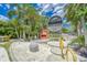 The entrance to Circles is tropical and features an oversized chair and fun, colorful art at 6412 Mayra Shores Ln, Apollo Beach, FL 33572