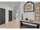 Spacious foyer featuring tiled floors, decorative accents, and neutral walls at 6412 Mayra Shores Ln, Apollo Beach, FL 33572