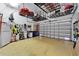 Oversized garage offers lots of storage, an automatic door, and space for tools at 6412 Mayra Shores Ln, Apollo Beach, FL 33572