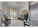 Well-lit office with balcony, water views, and a cozy reading area at 6412 Mayra Shores Ln, Apollo Beach, FL 33572