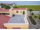 The gray rooftop patio overlooks the neighborhood and the bay at 6412 Mayra Shores Ln, Apollo Beach, FL 33572