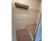 Walk-in closet with wire shelving and a cozy, carpeted alcove at the back at 6620 121St Ave # 1, Largo, FL 33773