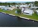 Scenic aerial view of single-story homes with boat docks and waterfront access at 800 Chesapeake Dr # 23, Tarpon Springs, FL 34689