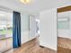 Bedroom with sliding glass doors out to the lanai at 800 Chesapeake Dr # 23, Tarpon Springs, FL 34689