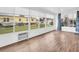 Bright sunroom with many windows and beautiful view of the property at 800 Chesapeake Dr # 23, Tarpon Springs, FL 34689