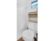 Small toilet with a built in shelf at 800 Chesapeake Dr # 23, Tarpon Springs, FL 34689