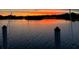 Sunset view over the calm lake water at 800 Chesapeake Dr # 23, Tarpon Springs, FL 34689