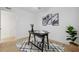 Bright office space with contemporary rug, modern desk and green plants at 8256 Lark St, Seminole, FL 33777