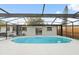 Backyard pool with screen, patio, and access to home at 8256 Lark St, Seminole, FL 33777