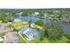 Waterfront property with screened pool and lush landscaping on a canal with bay access at 8759 Orient Ne Way, St Petersburg, FL 33702
