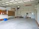 Spacious garage with ample storage space, including shelving units and room for tools and equipment at 8759 Orient Ne Way, St Petersburg, FL 33702