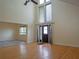 Bright living room features high ceilings, large windows, and open layout at 8759 Orient Ne Way, St Petersburg, FL 33702