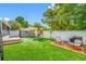 Great backyard featuring a play set, shed, patio with seating, and lush lawn at 12351 Cloverstone Dr, Tampa, FL 33624