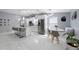 Beautiful kitchen featuring stainless appliances, breakfast bar, and eat in nook at 12351 Cloverstone Dr, Tampa, FL 33624