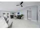 Open-concept living area boasts ample space and bright, airy atmosphere at 12351 Cloverstone Dr, Tampa, FL 33624