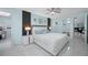 Spacious primary bedroom with ensuite bathroom features light walls and modern fixtures at 12351 Cloverstone Dr, Tampa, FL 33624