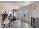 Welcoming foyer featuring decorative tile flooring, elegant furnishings, and ample natural light at 1453 Belleair Rd, Clearwater, FL 33756